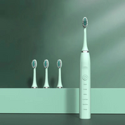 Spazzolino elettrico verde con tre testine di ricambio, design moderno, setole multicolore, ideale per igiene orale avanzata e cura dentale.