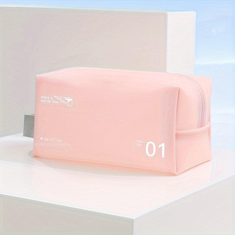 Astuccio da viaggio rosa chiaro con cerniera, design minimalista, ideale per cosmetici e accessori. Perfetto per organizzare in viaggio.