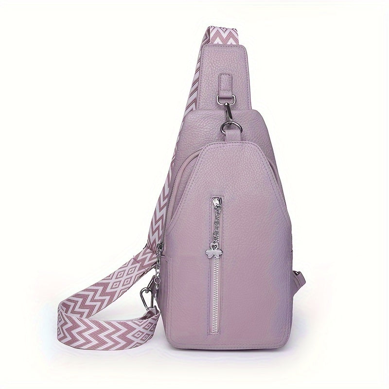 Zaino monospalla in pelle rosa chiaro con cerniera frontale e tracolla regolabile a motivo geometrico. Accessorio moda donna elegante e pratico.