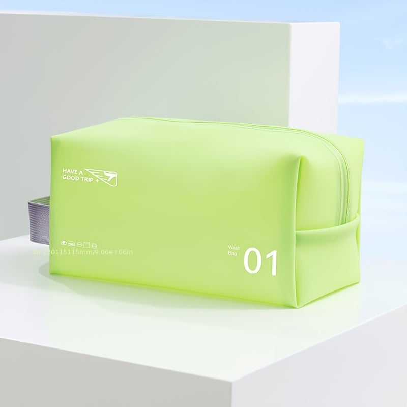 Borsa da viaggio verde lime con cerniera, design moderno, scritta "Have a Good Trip", ideale per organizzare accessori da viaggio.