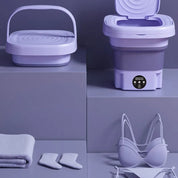 Lavatrice portatile pieghevole viola, ideale per piccoli spazi, con design compatto e accessori inclusi. Perfetta per viaggi e uso domestico.