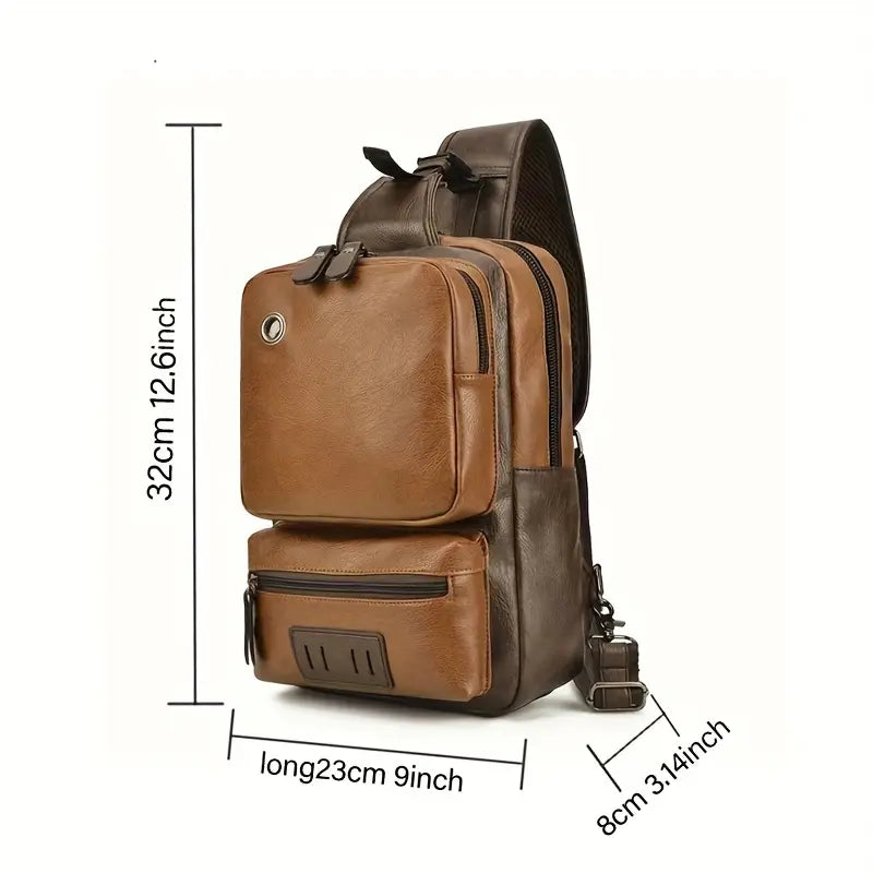 Zaino a tracolla in pelle marrone, dimensioni 32x23x8 cm, con tasche multiple e design elegante. Ideale per lavoro e viaggio.