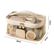 Borsa trasparente per cosmetici, 26x17x13 cm, con cerniera dorata, contenente trucchi e accessori. Ideale per organizzare prodotti di bellezza.