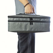 Borsa termica grigia con doppia cerniera, manico robusto, ideale per trasporto cibo e bevande. Design moderno, perfetta per picnic e viaggi.