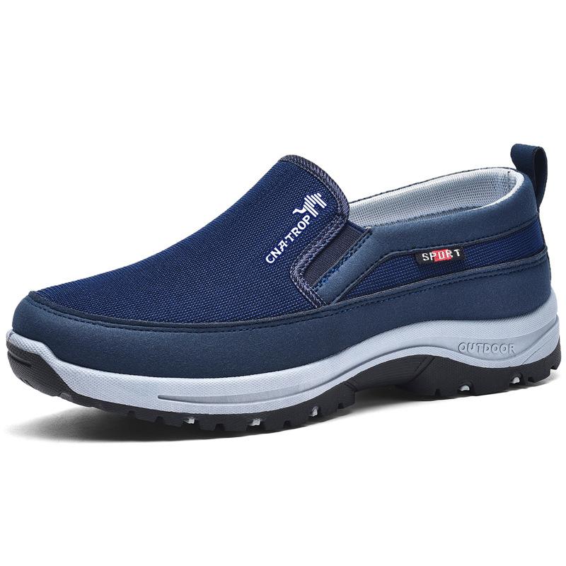 Scarpa da uomo blu slip-on, suola antiscivolo, design sportivo, ideale per attività all'aperto. Comfort e stile per ogni occasione.