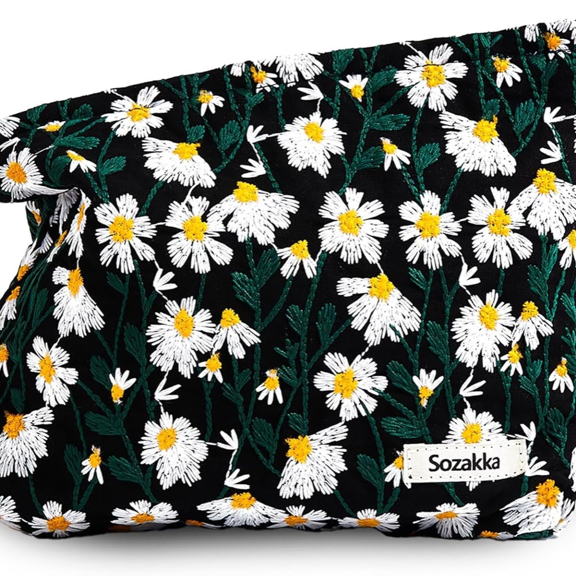 Borsa a tracolla nera con ricamo floreale di margherite bianche e gialle, marchio Sozakka. Accessorio moda elegante e versatile.