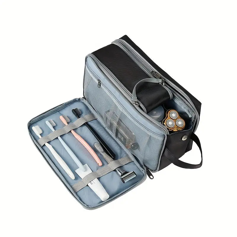 Borsa da viaggio organizer aperta con spazzolini, rasoio e flaconi. Ideale per accessori da bagno, compatta e pratica per viaggi.
