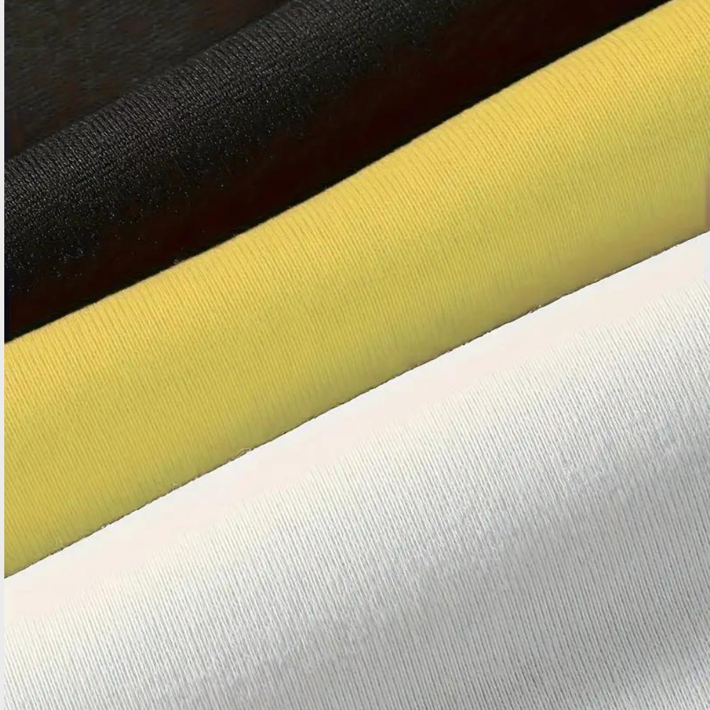 Tessuti in cotone a righe: nero, giallo, bianco. Materiale di alta qualità per abbigliamento, cucito, artigianato. Morbido e resistente.