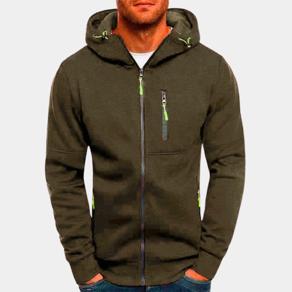 Felpa con cappuccio verde oliva da uomo, zip frontale, tasche con cerniera, dettagli verdi. Abbigliamento casual, moda maschile autunnale.
