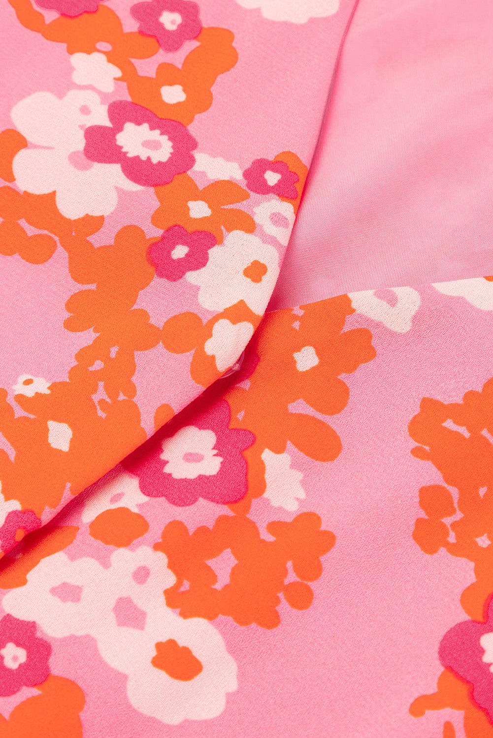 Giacca rosa con motivo floreale arancione e bianco, tessuto di alta qualità, moda donna, abbigliamento elegante, stile primaverile vivace.