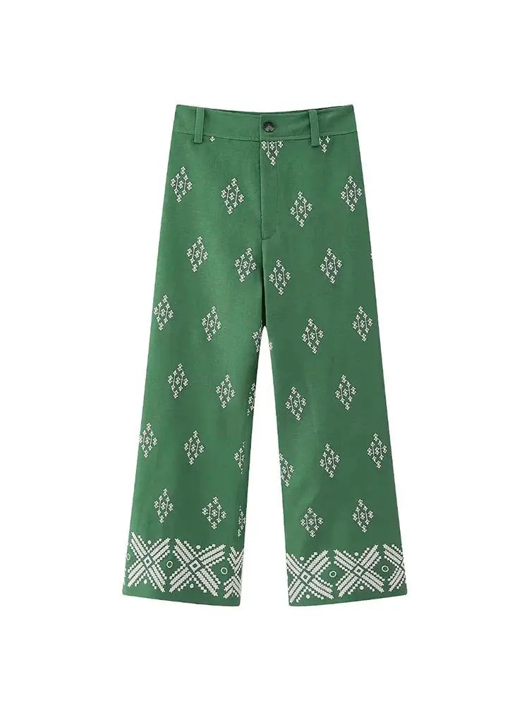 Pantaloni verdi a gamba larga con motivo geometrico bianco, stile casual, tessuto leggero, perfetti per moda estiva e look quotidiano.