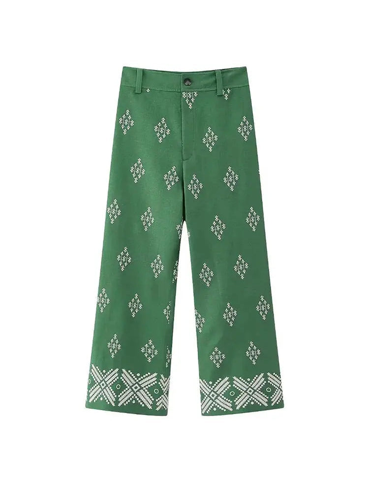 Pantaloni verdi a gamba larga con motivo geometrico bianco, stile casual, tessuto leggero, perfetti per moda estiva e look quotidiano.