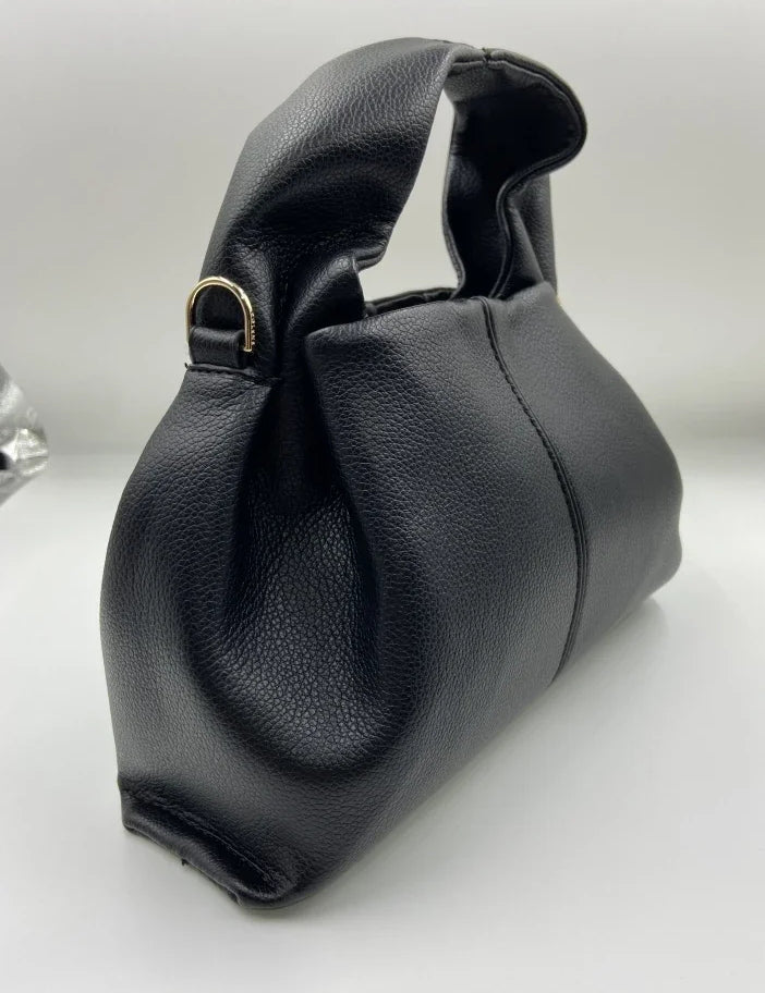 Borsa a mano in pelle nera, design elegante e moderno, con manico robusto e dettagli metallici dorati. Accessorio moda donna di lusso.