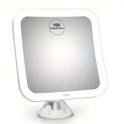 Specchio ingranditore 10x con luce LED, design quadrato, base regolabile, ideale per trucco e cura del viso, accessorio bagno moderno.