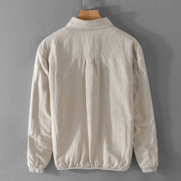 Giacca beige in velluto a coste, vista posteriore, appesa su gruccia. Design casual, ideale per moda autunnale e invernale.