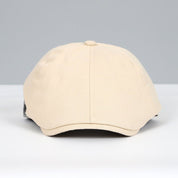 Cappello da baseball beige unisex, design classico, visiera curva, tessuto in cotone, ideale per moda casual e protezione solare.