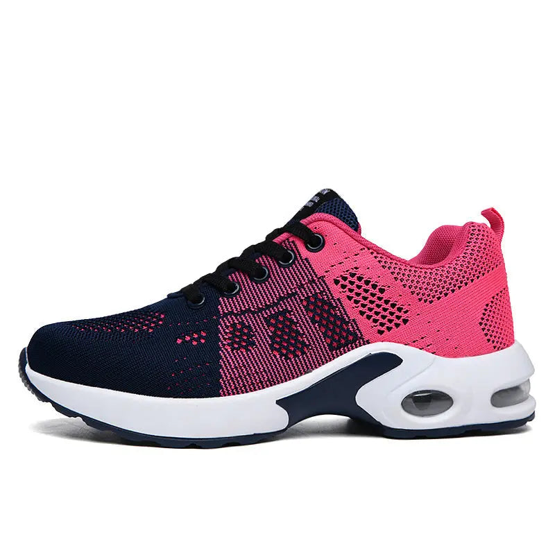 Scarpe da ginnastica donna, design bicolore blu e rosa, suola ammortizzata, traspiranti, ideali per corsa e sport. Moda e comfort.