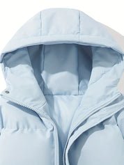 Giacca invernale imbottita azzurra con cappuccio, chiusura a zip, design trapuntato. Ideale per moda donna, abbigliamento caldo e casual.