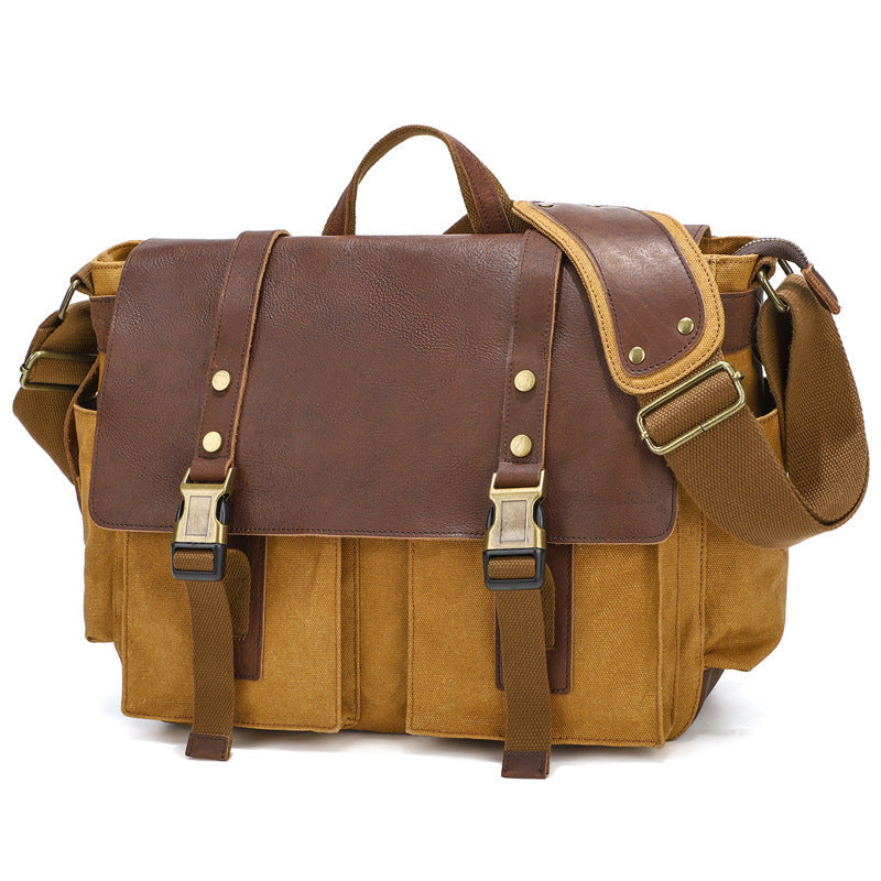 Borsa a tracolla vintage in tela marrone e pelle, con fibbie in metallo e tasche multiple. Ideale per lavoro, scuola o viaggio.