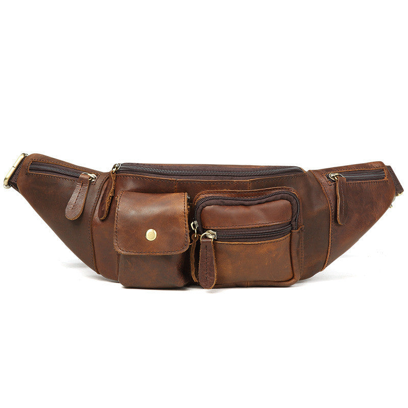 Marsupio in pelle marrone vintage con multiple tasche e cerniere, ideale per viaggi e uso quotidiano. Accessorio moda pratico e resistente.