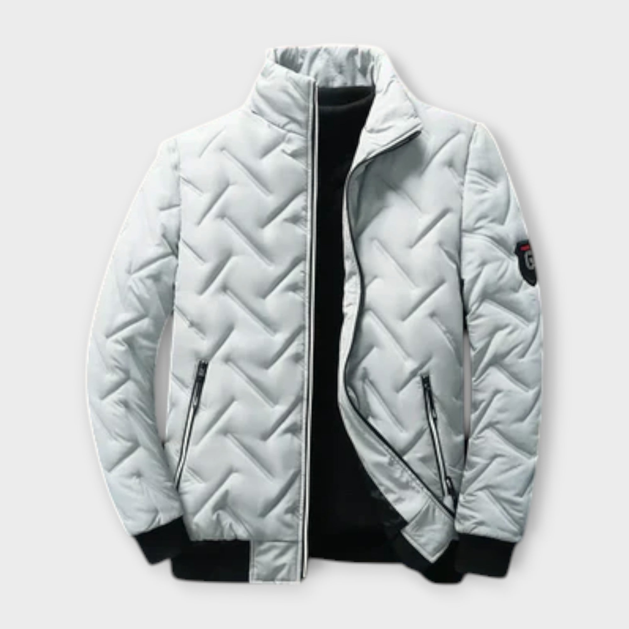 Giacca invernale imbottita bianca da uomo, con zip frontale, colletto alto e tasche laterali. Design moderno, ideale per climi freddi.