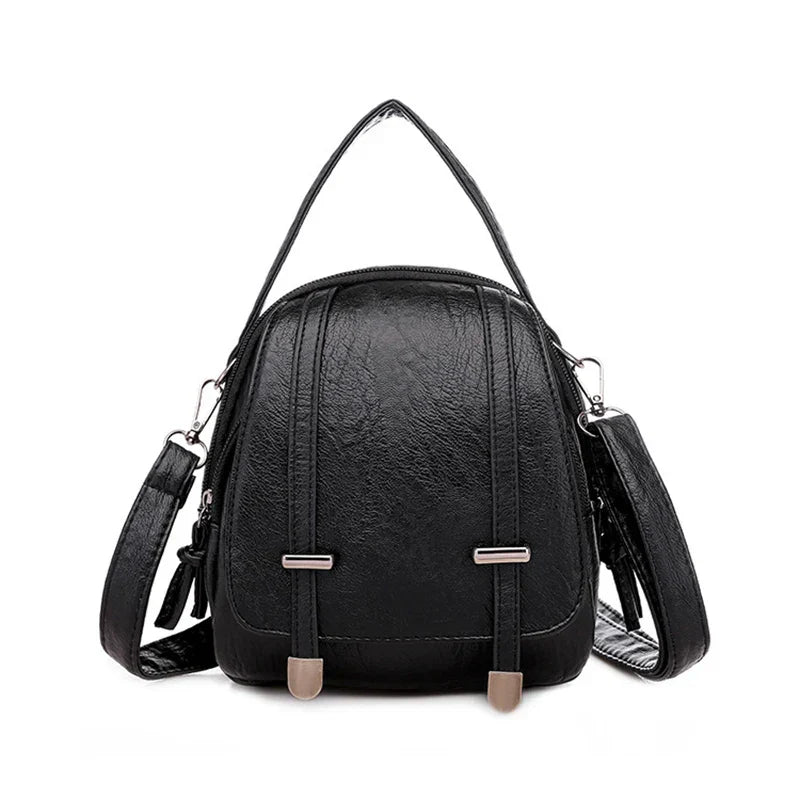 Zaino in pelle nera elegante con cinghie regolabili, design moderno e chiusura a zip. Perfetto per moda donna, accessori casual e viaggi.