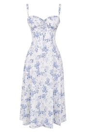 Abito estivo donna a fiori blu e bianchi, stile vintage, con spalline sottili e scollo a cuore. Perfetto per occasioni casual e eleganti.