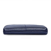 Portafoglio in pelle blu scuro, design elegante e sottile, ideale per uomo, accessorio moda, alta qualità, perfetto per carte e contanti.