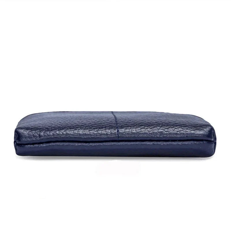 Portafoglio in pelle blu scuro, design elegante e sottile, ideale per uomo, accessorio moda, alta qualità, perfetto per carte e contanti.