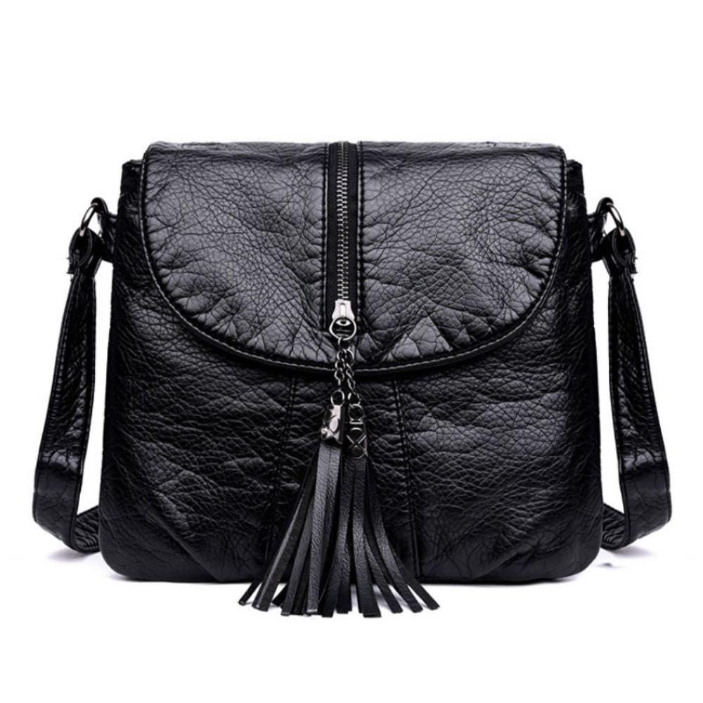 Borsa a tracolla in pelle nera con zip centrale e nappine decorative, design elegante e moderno, accessorio moda donna.