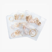 Contenitori trasparenti per gioielli con scomparti multipli, ideali per organizzare bracciali, anelli e collane. Soluzione pratica per conservare accessori.