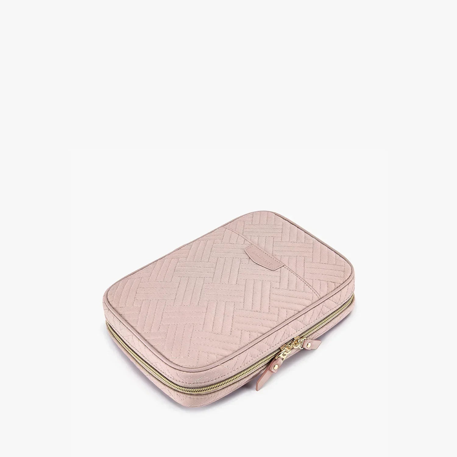 Custodia rosa trapuntata per laptop, design elegante con cerniera dorata, ideale per protezione e trasporto sicuro di dispositivi elettronici.