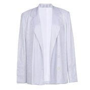 Giacca blazer donna argento scintillante, elegante e moderna, ideale per eventi formali. Design classico con bottoni, tessuto lucido.