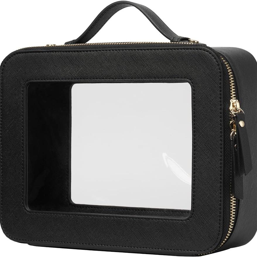 Custodia da viaggio nera con finestra trasparente, manico superiore e cerniera dorata. Ideale per cosmetici e accessori. Design elegante e funzionale.