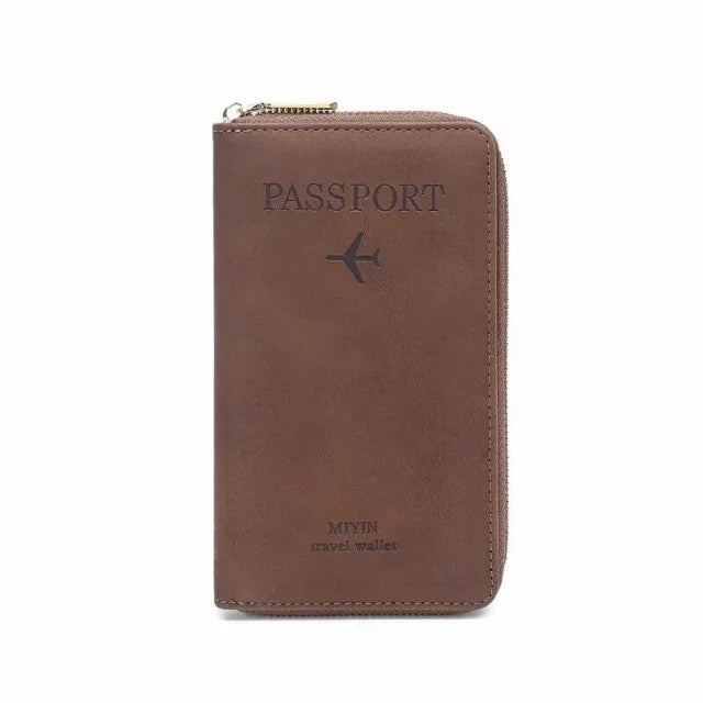 Portafoglio da viaggio in pelle marrone con cerniera, design per passaporto, logo aereo, ideale per organizzare documenti e carte durante i viaggi.