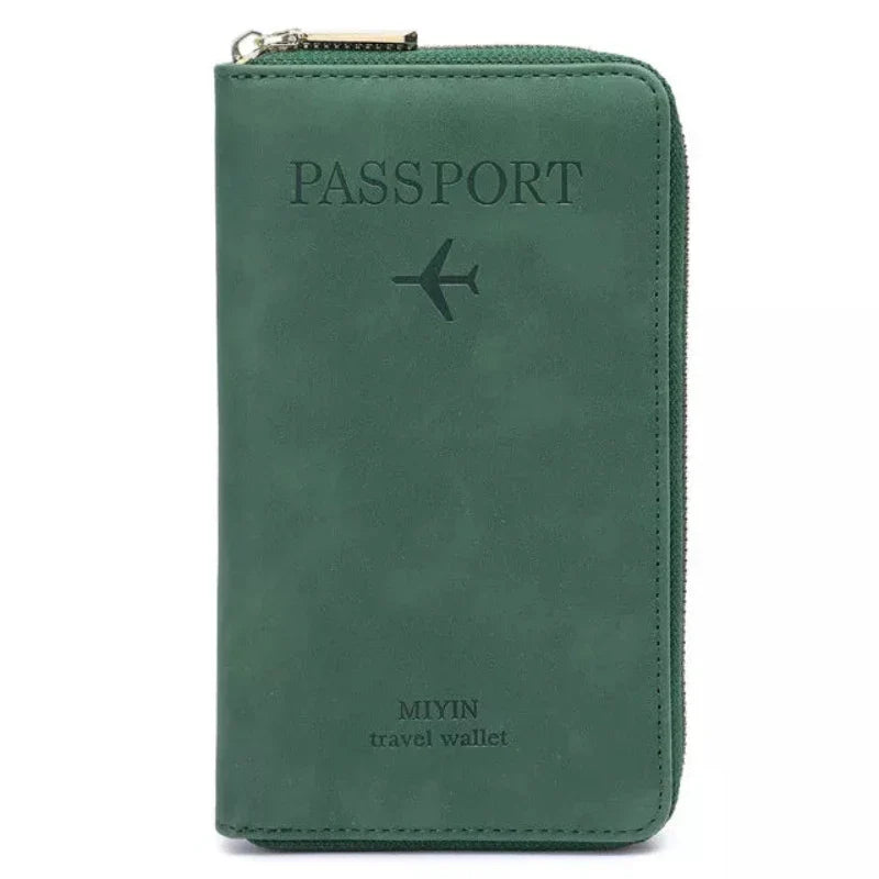 Portafoglio da viaggio verde in pelle con cerniera, design per passaporto, logo aereo, ideale per organizzare documenti e carte durante i viaggi.