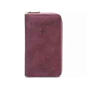 Custodia passaporto in pelle rosa con cerniera, design elegante con icona aereo, ideale per viaggi, portafoglio da viaggio compatto e funzionale.