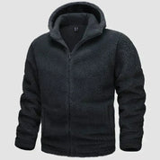 Giacca in pile nero con cappuccio, chiusura a zip, design caldo e morbido, ideale per l'inverno. Abbigliamento casual uomo, moda autunno inverno.