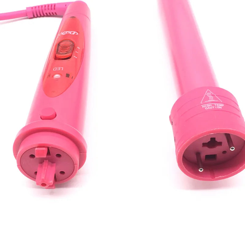 Ferro arricciacapelli rosa con controllo temperatura LED, design cilindrico, doppia tensione, ideale per styling capelli professionale e domestico.