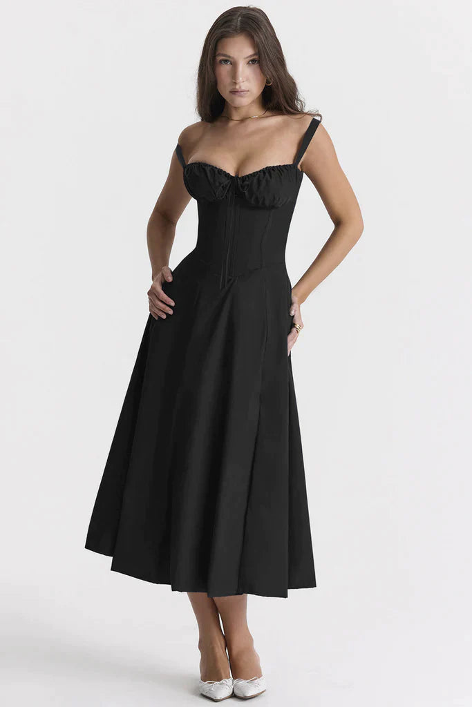 Abito nero elegante donna, scollo a cuore, spalline sottili, lunghezza midi, stile corsetto, perfetto per serate e occasioni speciali.