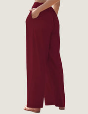 Pantaloni palazzo rossi da donna, vita alta, tasche laterali, tessuto leggero, eleganti e comodi, ideali per look casual e formali.