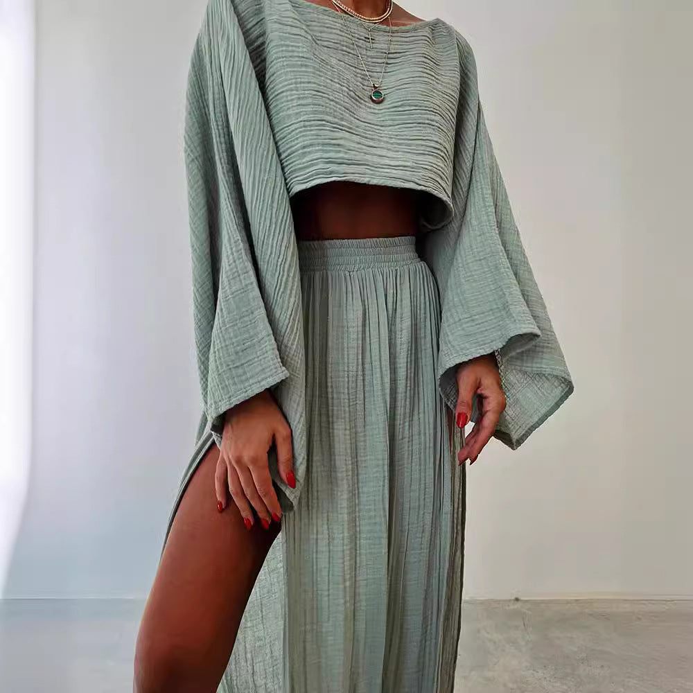 Abito estivo donna in cotone verde menta, due pezzi, maniche larghe, gonna lunga con spacco. Moda casual elegante, tessuto leggero e traspirante.