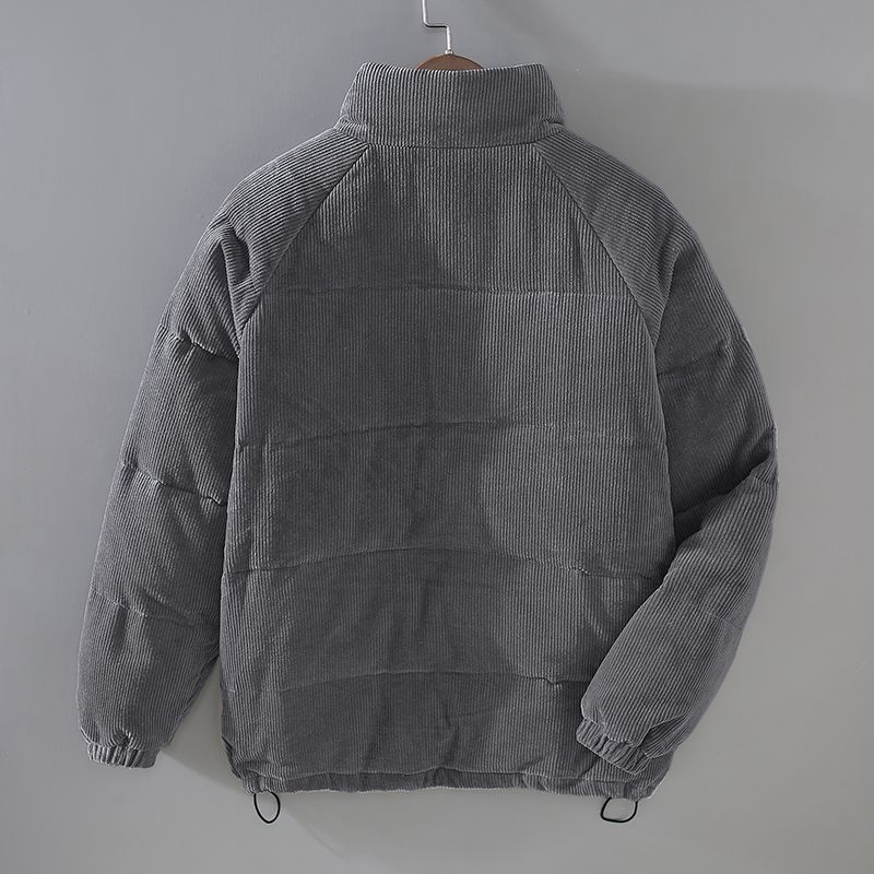 Giacca invernale grigia in velluto a coste, design trapuntato, collo alto, maniche lunghe, ideale per moda uomo, abbigliamento caldo e casual.