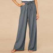 Pantaloni palazzo grigi da donna con vita alta arricciata e cintura, tessuto leggero, eleganti e casual, ideali per moda estiva.