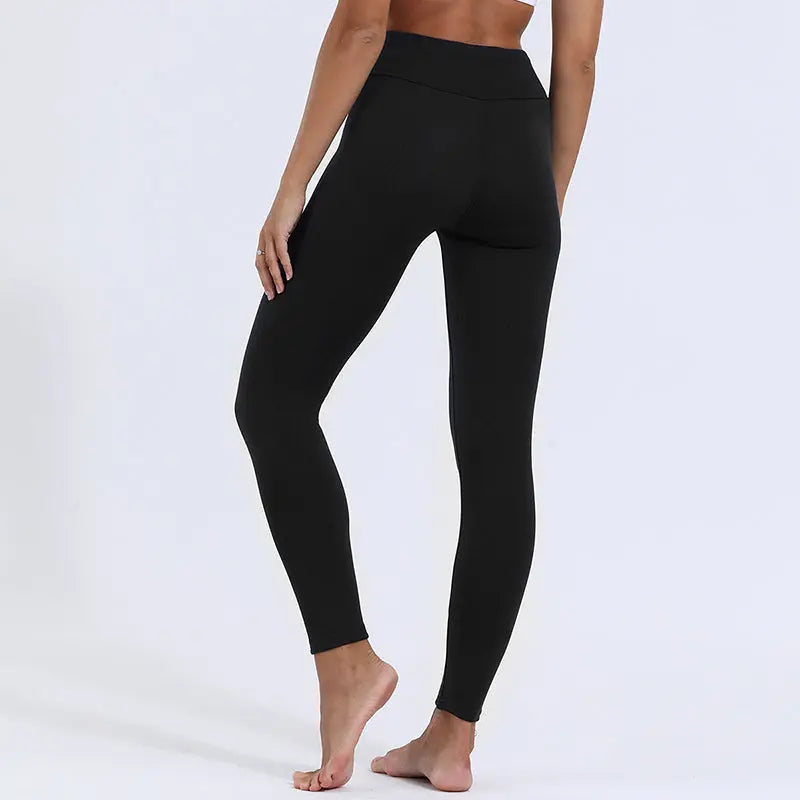 Pantaloni yoga donna neri, vita alta, elasticizzati, comodi per fitness e allenamento. Design aderente, tessuto traspirante.