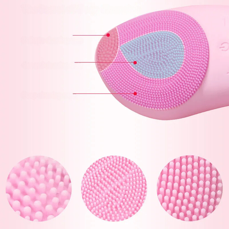 Spazzola viso in silicone rosa con setole morbide, design ergonomico, ideale per pulizia profonda e massaggio viso. Accessorio skincare efficace.