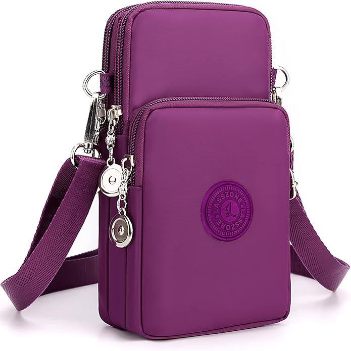 Borsa a tracolla viola in nylon impermeabile con doppia cerniera, tasche multiple e tracolla regolabile. Accessorio moda donna elegante e pratico.