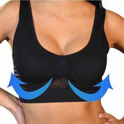 Reggiseno sportivo nero senza cuciture, supporto push-up, design traspirante, frecce blu indicano sollevamento, comfort per attività fisica.