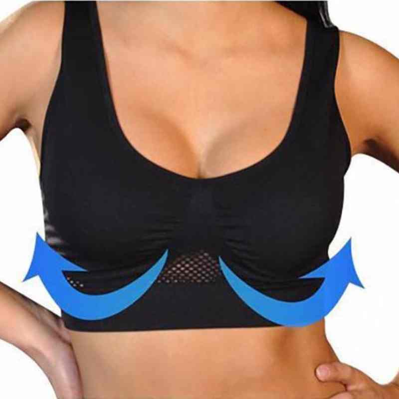 Reggiseno sportivo nero senza cuciture, supporto push-up, design traspirante, frecce blu indicano sollevamento, comfort per attività fisica.