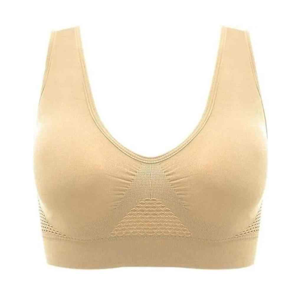 Reggiseno sportivo senza cuciture beige, design confortevole e traspirante, ideale per attività fisica e supporto quotidiano.
